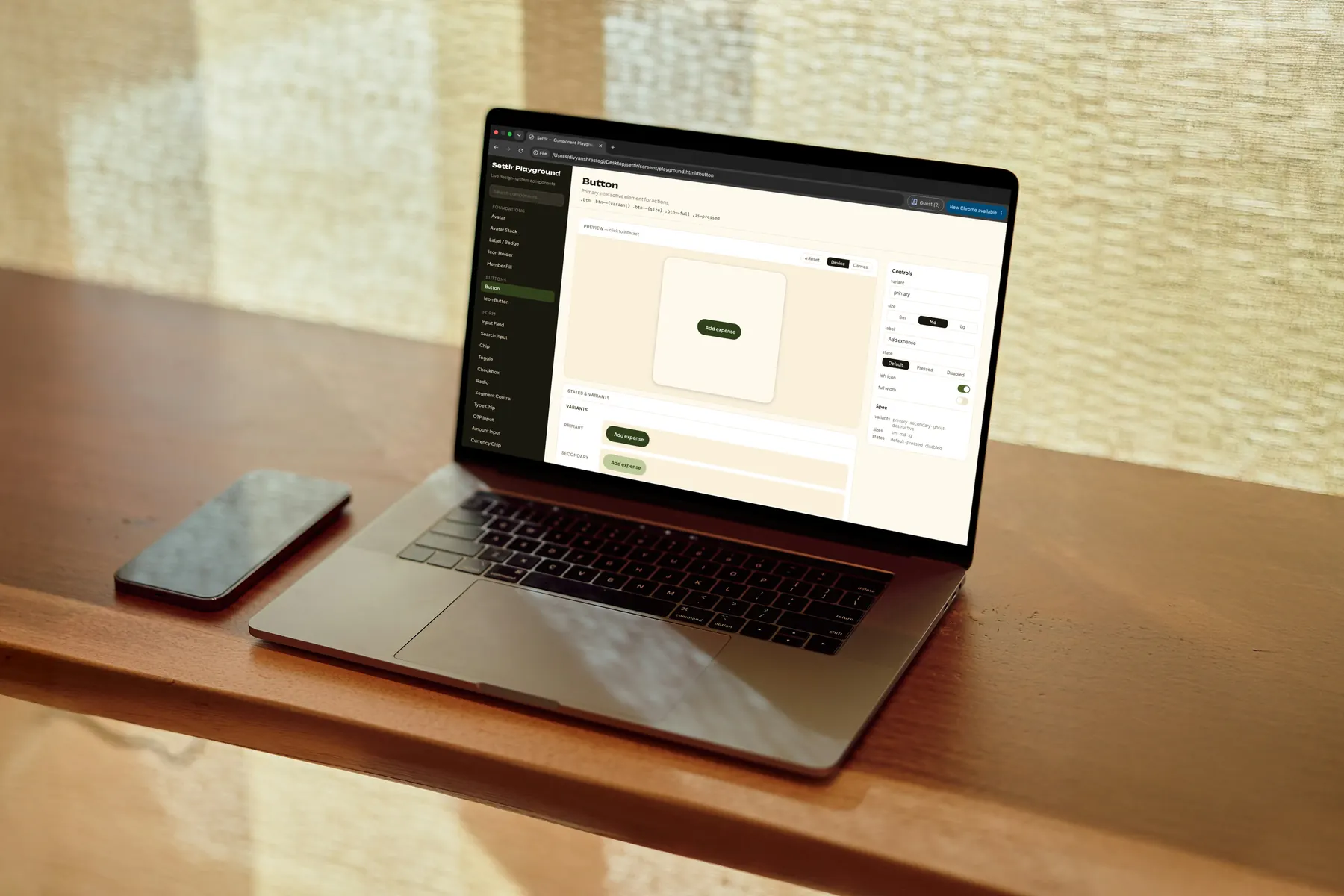 Settlr component playground open on a laptop